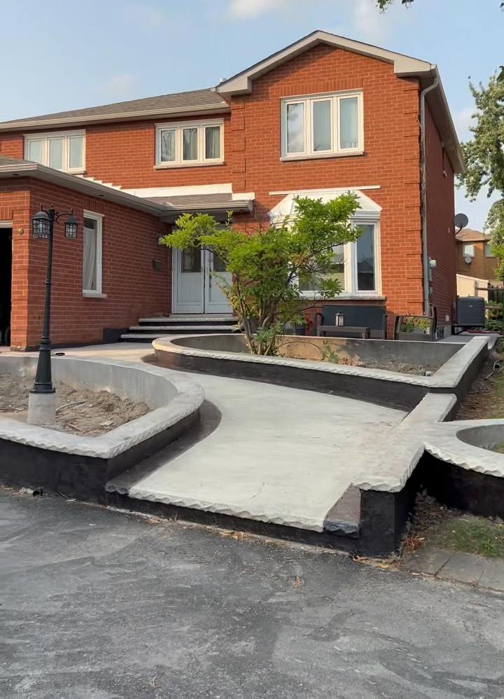 Raised concrete front entrance and walkway